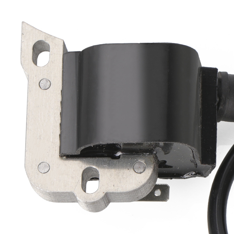 Close-up of chainsaw ignition coil mounting plate